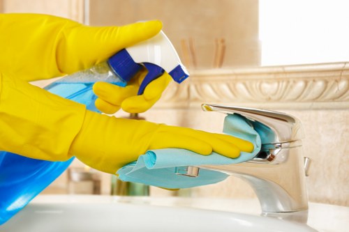 Cleaner responding to an emergency procedure in a workplace